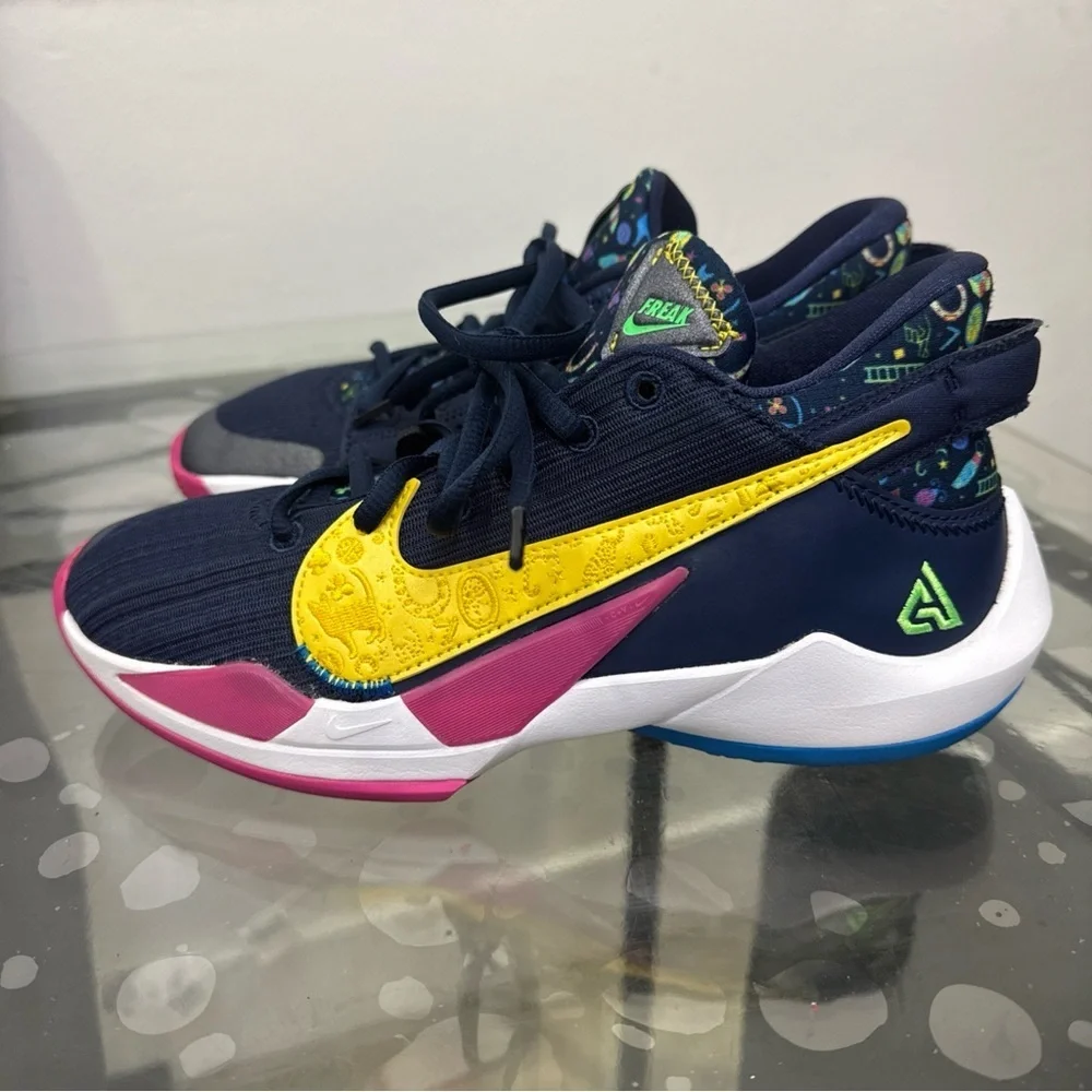Nike Kids Navy Sneakers with Pink and Yellow Accents